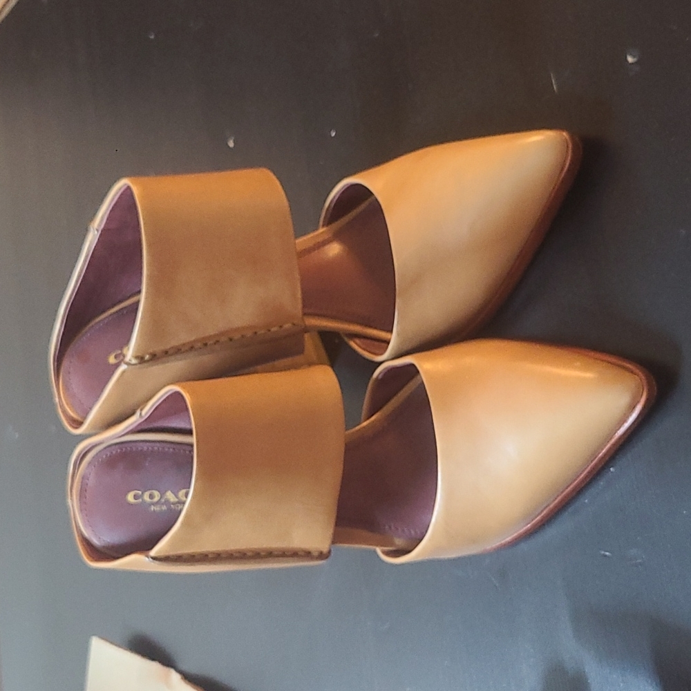 MOVING SALE. EVERYTHING MUST GO! Coach healed mules. Sz 7. Excellent condition.